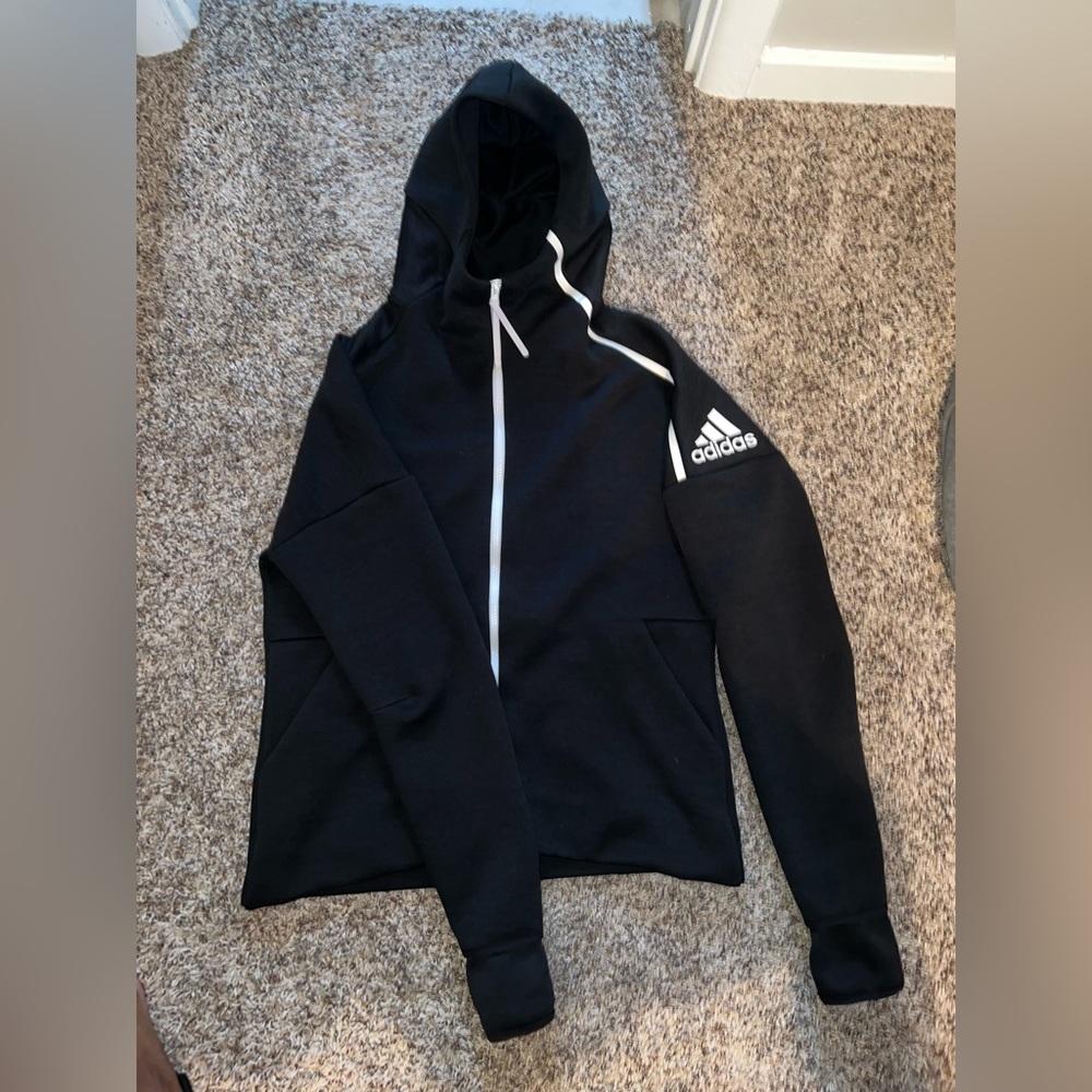 Woman’s Adidas sweat suit